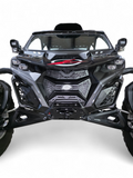 2024 Can-Am Maverick R fitted with Volt 3-Piece Grille in hammer black powder coat
    finish, full front view on a desert trail showing contour-matched fitment and
    billet aluminum badge detail