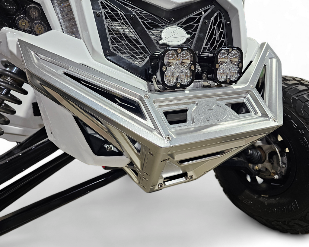 Installed profile of clear anodized billet front winch bumper on Can-Am Maverick X3 demonstrating body-line fitment
